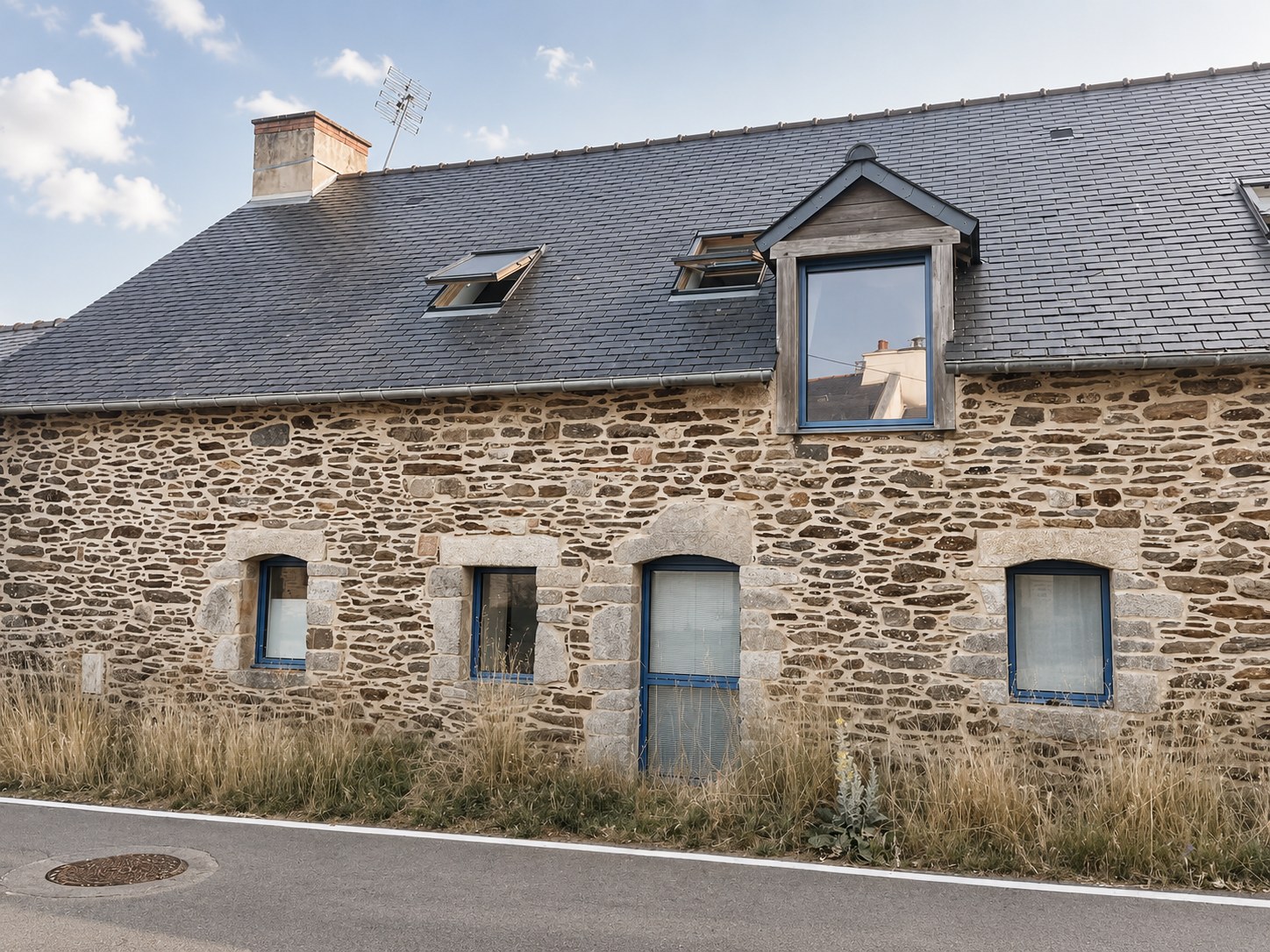 Façade en pierre d'origine de la maison de Banastère